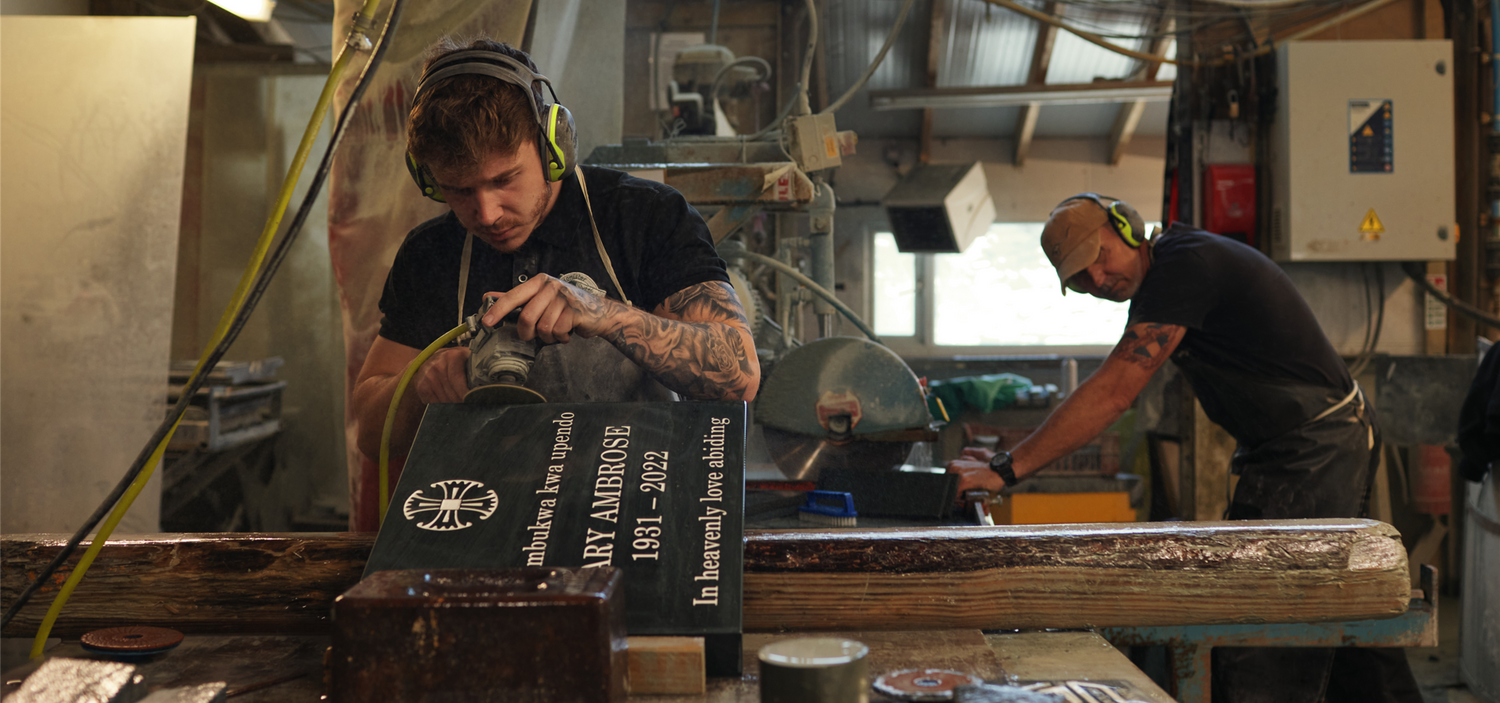 craftsmen working on headstones