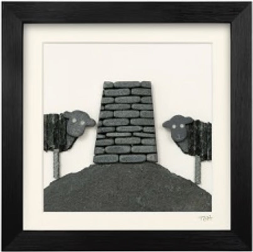 slate frame of two Herdwick Sheep and a stone cairn