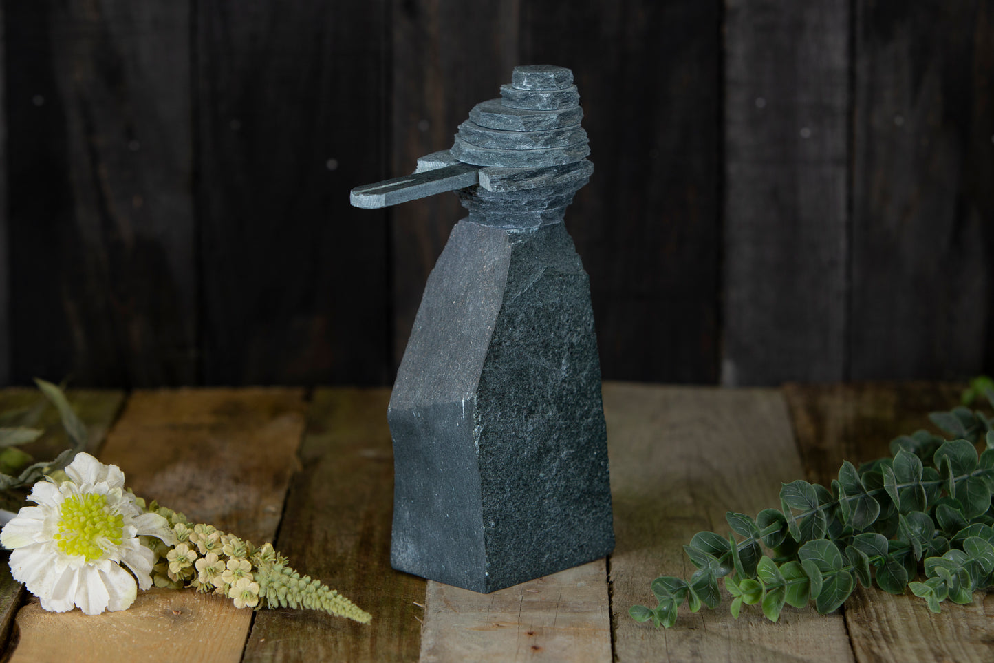 A slate Robin sculpture on a rock - bestseller slate ornament