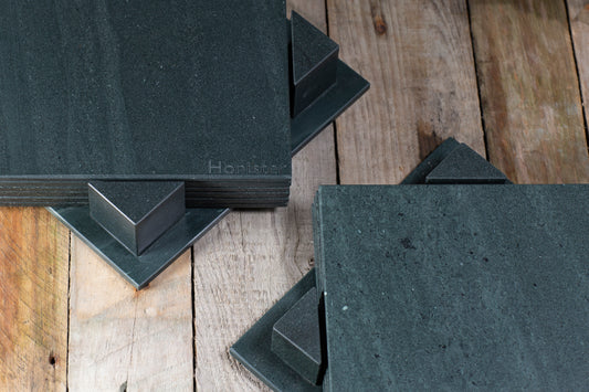 two sets of slate table mat