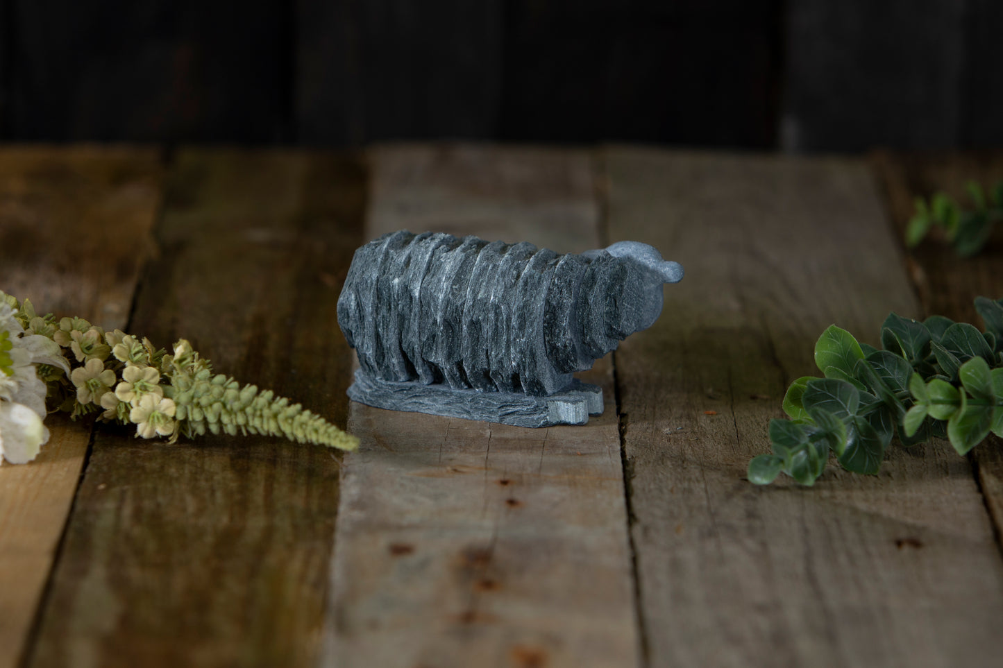 Slate lying lamb sculpture