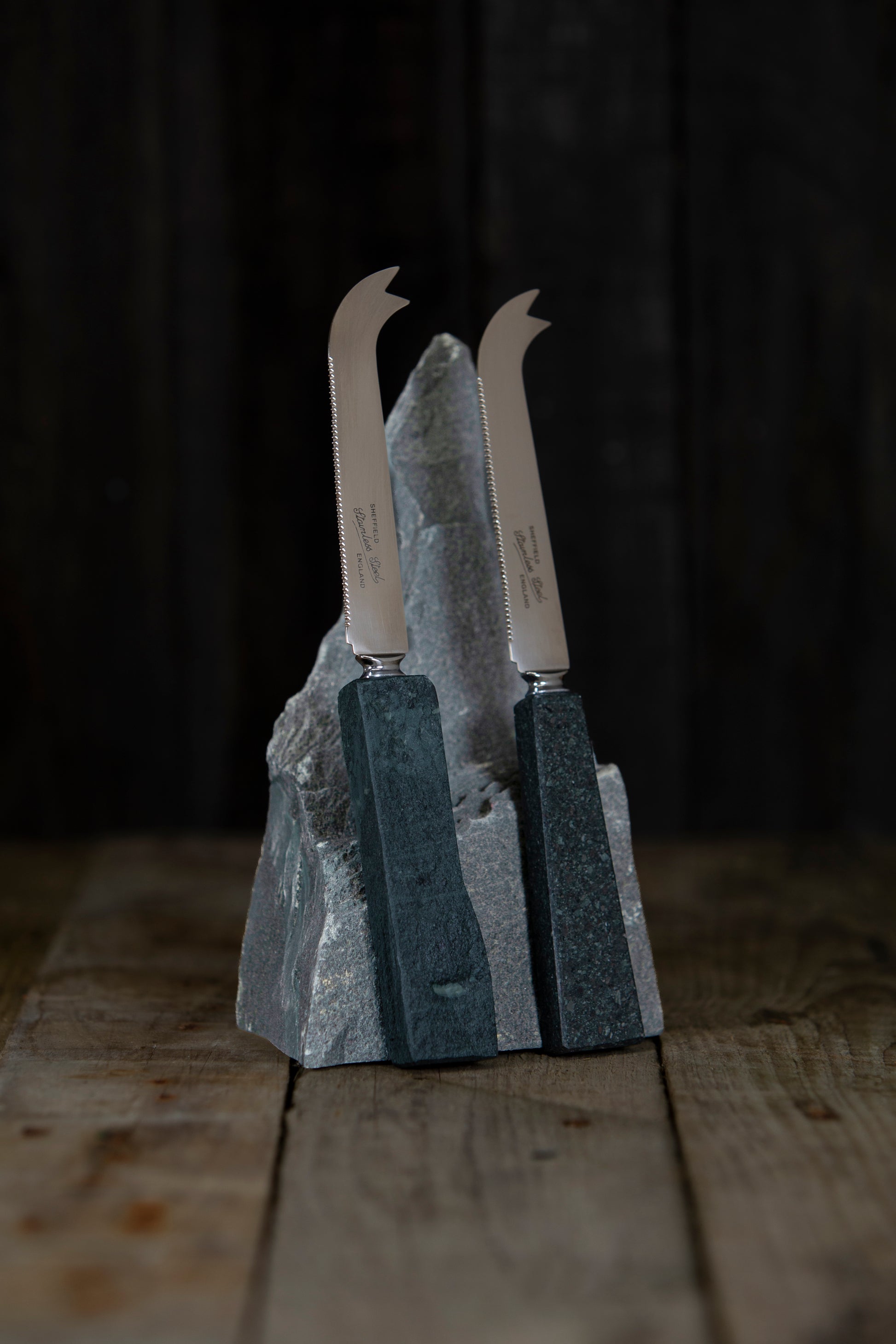 Two slate cheese knives